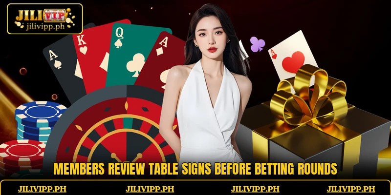 Members review table signs before betting rounds